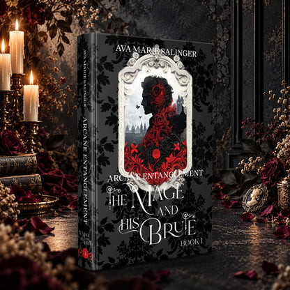 Arcane Entanglement (The Mage and His Brute Book 1) Special Edition Hardback by Ava Marie Salinger among candles, red roses and a cameo pendant