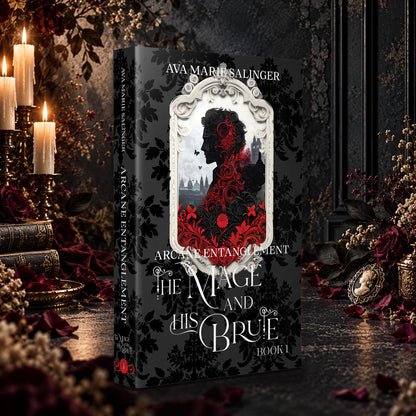 Arcane Entanglement (The Mage and His Brute Book 1) Special Edition Paperback by Ava Marie Salinger among candles, red roses and a cameo pendant
