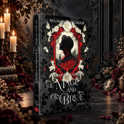 Crimson Codex (The Mage and His Brute Book 3) Special Edition Hardback by Ava Marie Salinger among candles, red roses and a cameo pendant