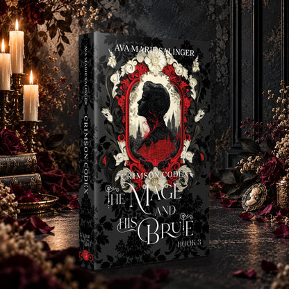 Crimson Codex (The Mage and His Brute Book 3) Special Edition Paperback by Ava Marie Salinger among candles, red roses and a cameo pendant
