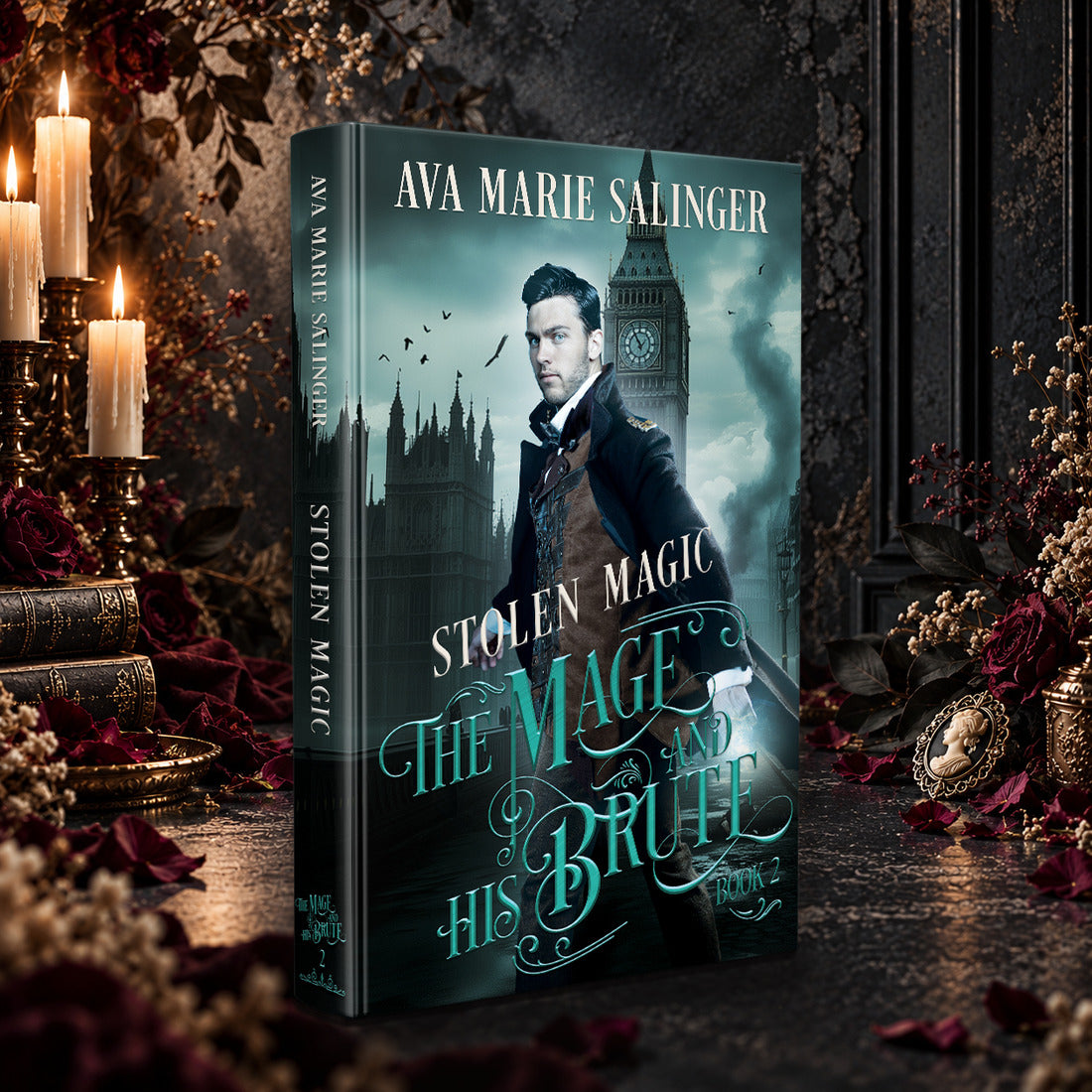 Stolen Magic (The Mage and His Brute Book 2) Hardback by Ava Marie Salinger among candles, red roses and a cameo pendant