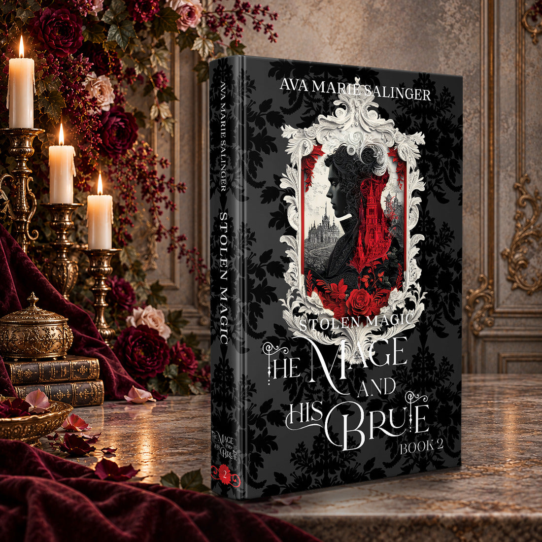 Stolen Magic (The Mage and His Brute Book 2) Special Edition Hardback by Ava Marie Salinger on a candlelit marble table with red roses and gold candlesticks