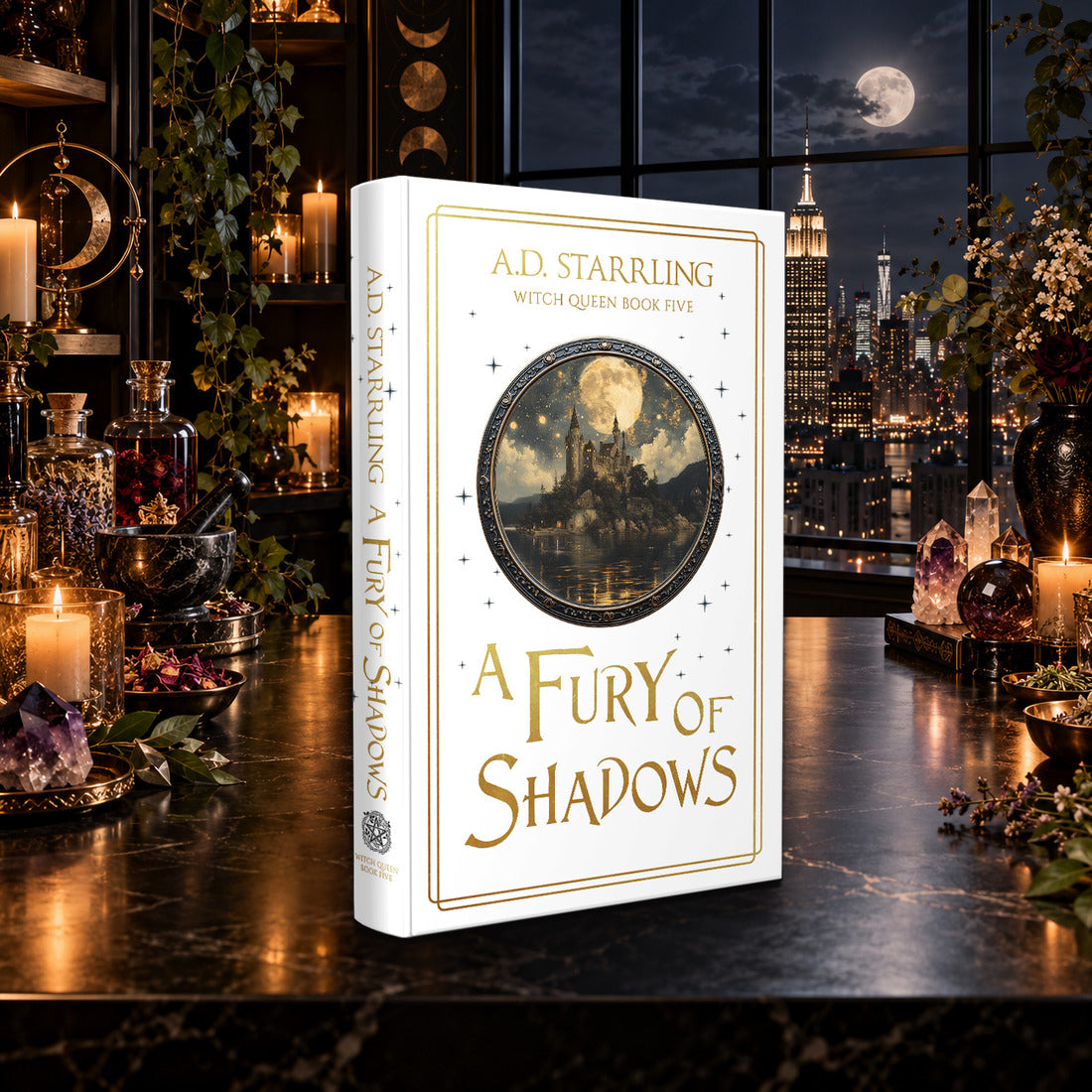 A Fury of Shadows (Witch Queen Book 5) Special Edition Hardback by A.D. Starrling on a marble table by a moonlit window over the New York skyline