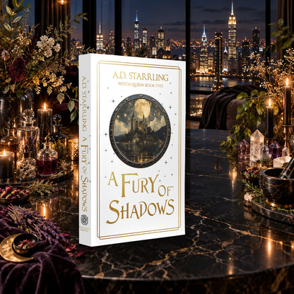 A Fury of Shadows (Witch Queen Book 5) Special Edition Paperback by A.D. Starrling on a marble table among crystals and candles with the New York skyline at night