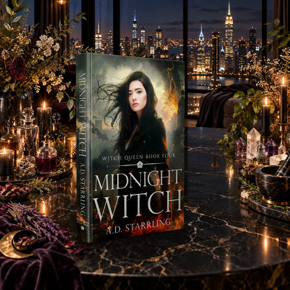Midnight Witch (Witch Queen Book 4) Hardback by A.D. Starrling on a marble table among crystals and candles with the New York skyline at night