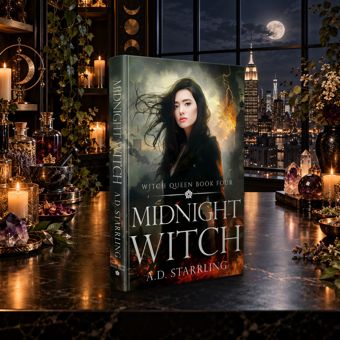 Midnight Witch (Witch Queen Book 4) Hardback by A.D. Starrling on a marble table by a moonlit window over the New York skyline