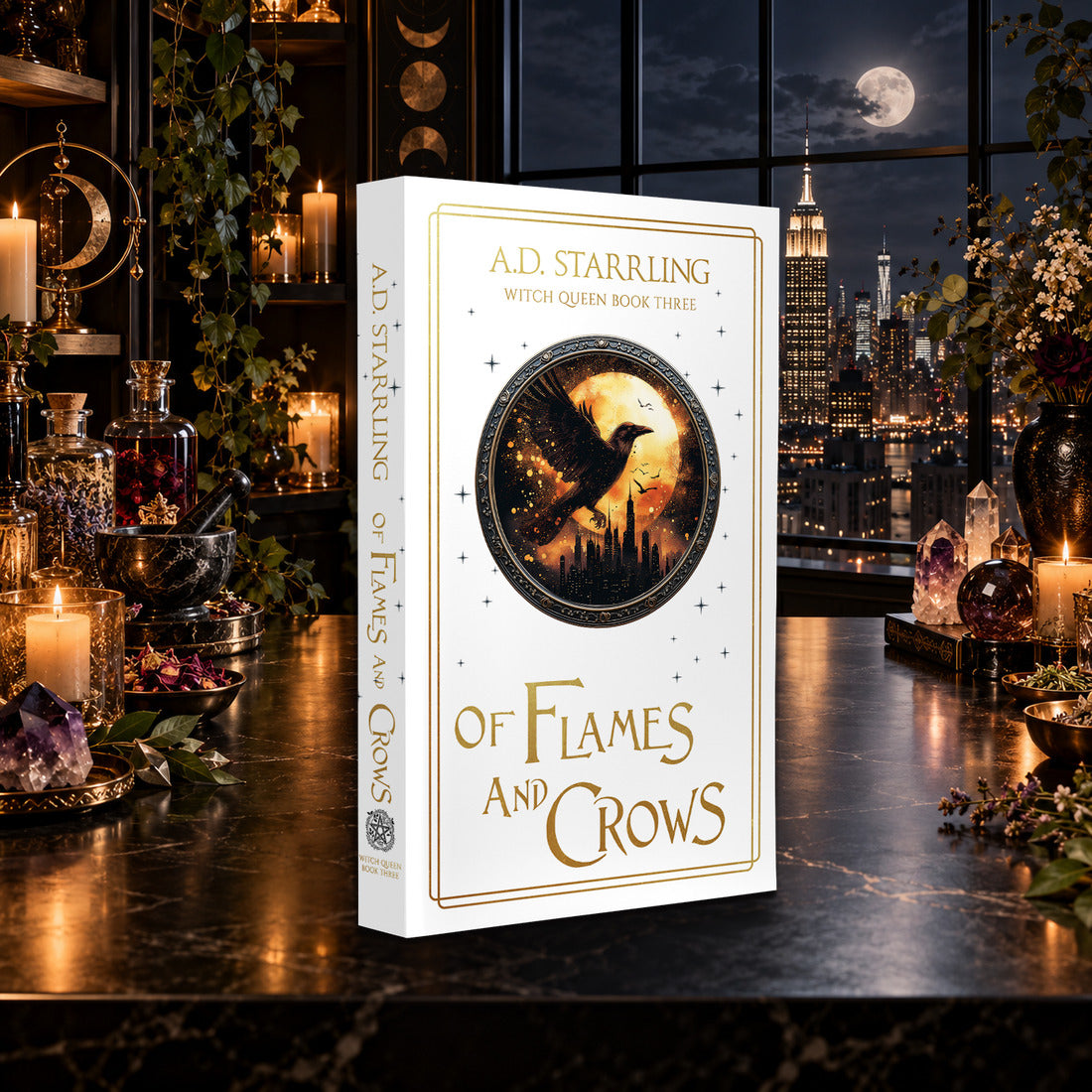 Of Flames and Crows (Witch Queen Book 3) Special Edition Paperback by A.D. Starrling on a marble table by a moonlit window over the New York skyline