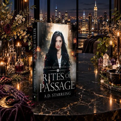 Rites of Passage (Witch Queen Book 2) Paperback by A.D. Starrling on a marble table among crystals and candles with the New York skyline at night