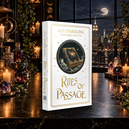 Rites of Passage (Witch Queen Book 2) Special Edition Paperback by A.D. Starrling on a marble table by a moonlit window over the New York skyline