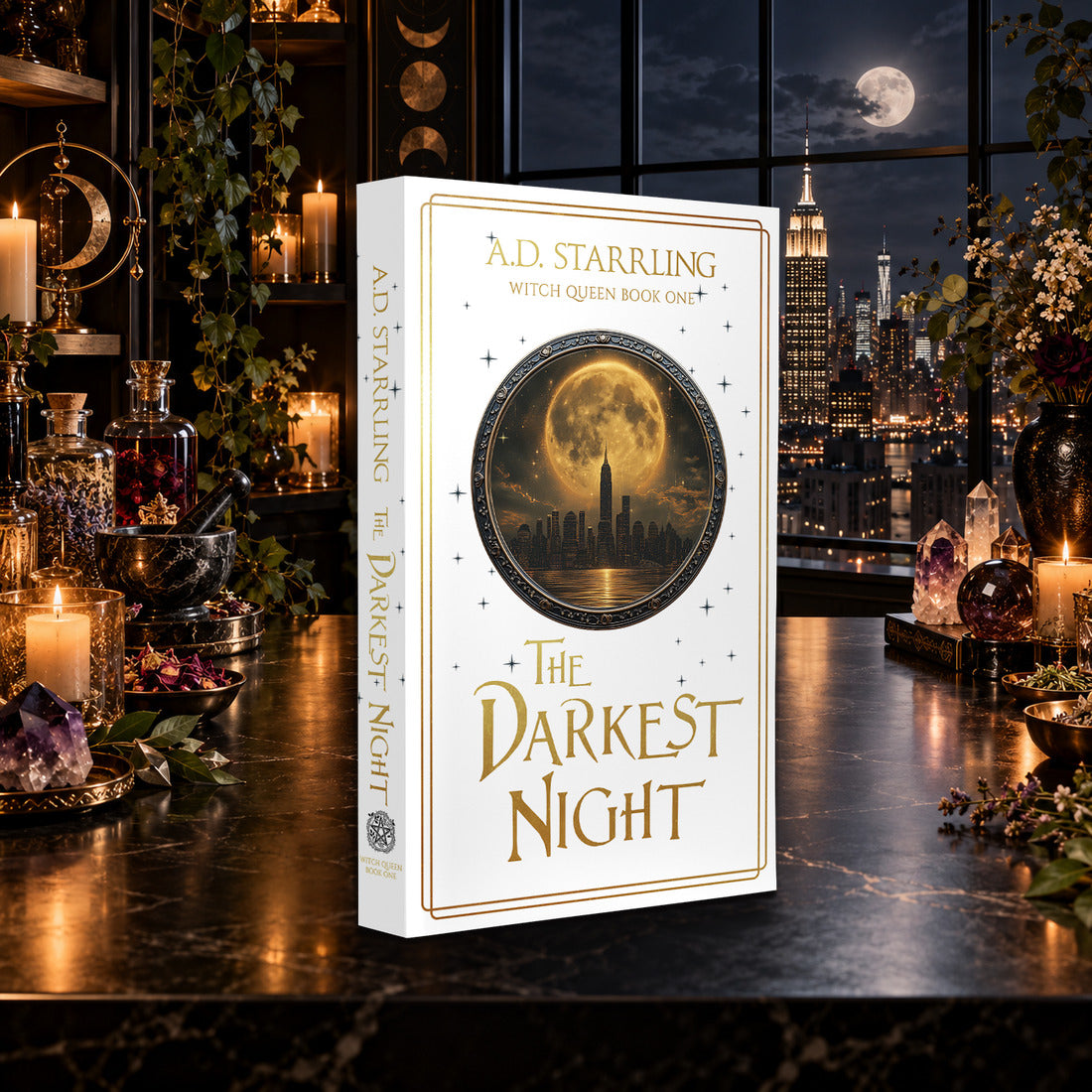 The Darkest Night (Witch Queen Book 1) Special Edition Paperback by A.D. Starrling on a marble table by a moonlit window over the New York skyline