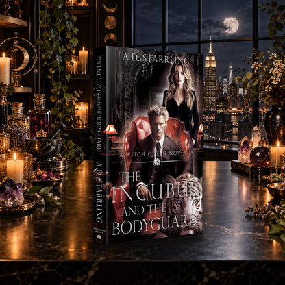 The Incubus and the Bodyguard (A Witch Queen Novella) Paperback by A.D. Starrling on a marble table by a moonlit window over the New York skyline