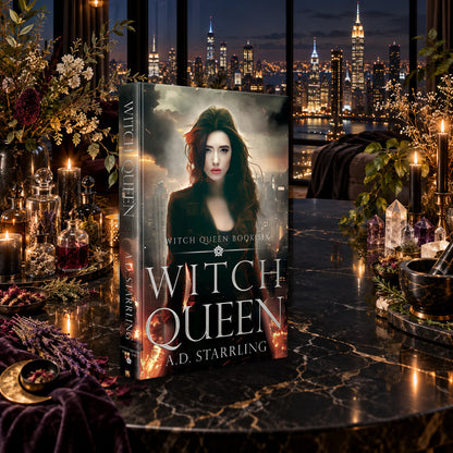 Witch Queen (Witch Queen Book 6) Hardback by A.D. Starrling on a marble table among crystals and candles with the New York skyline at night