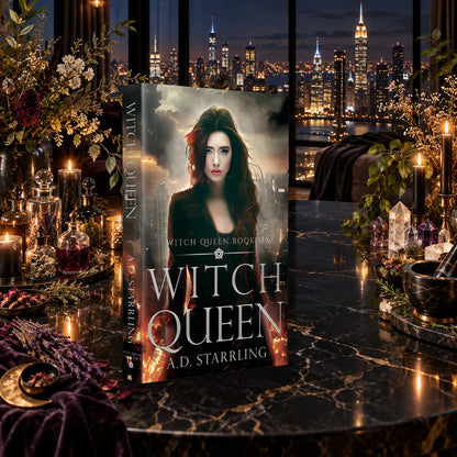 Witch Queen (Witch Queen Book 6) Paperback by A.D. Starrling on a marble table among crystals and candles with the New York skyline at night